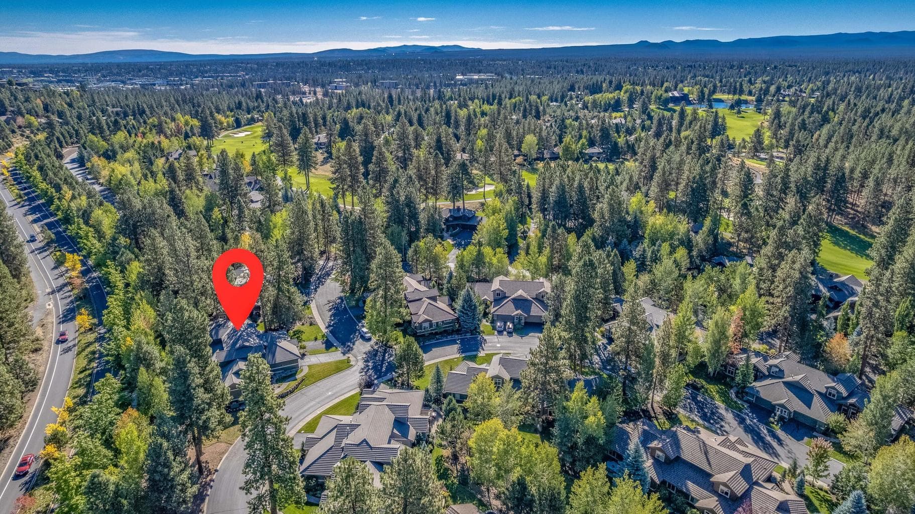 The Broken Top neighborhood on Bend's westside is planned around a golf course, lake, and club house. Membership is optional, more information is attached to the listing