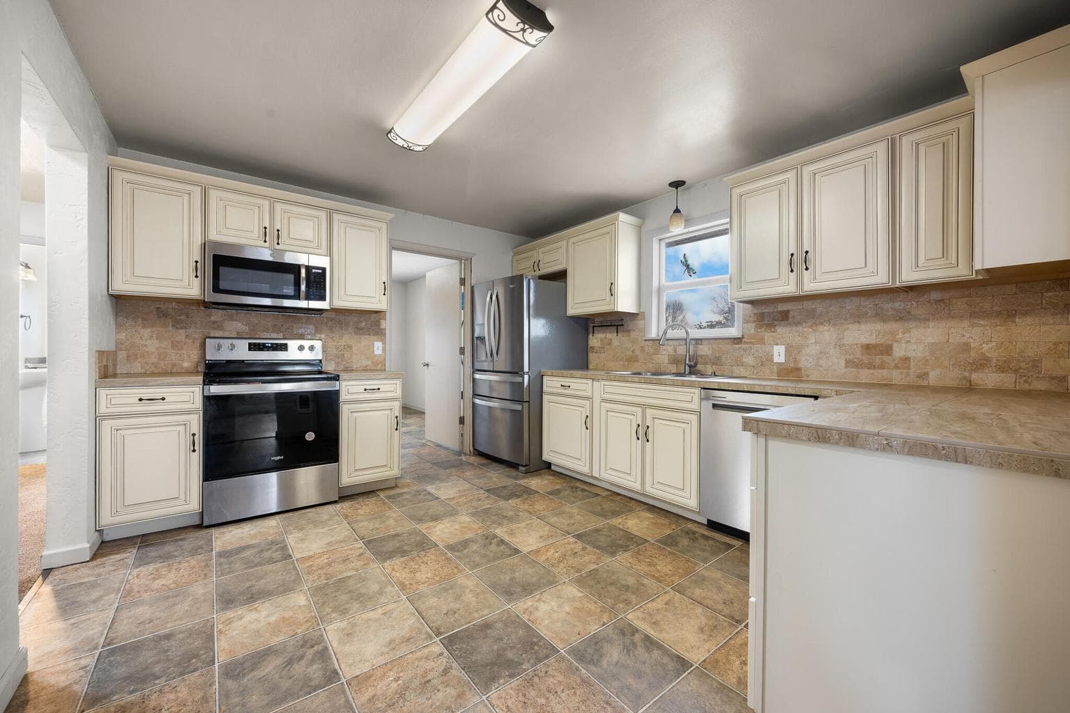 Kitchen has newer stainless steal appliances.