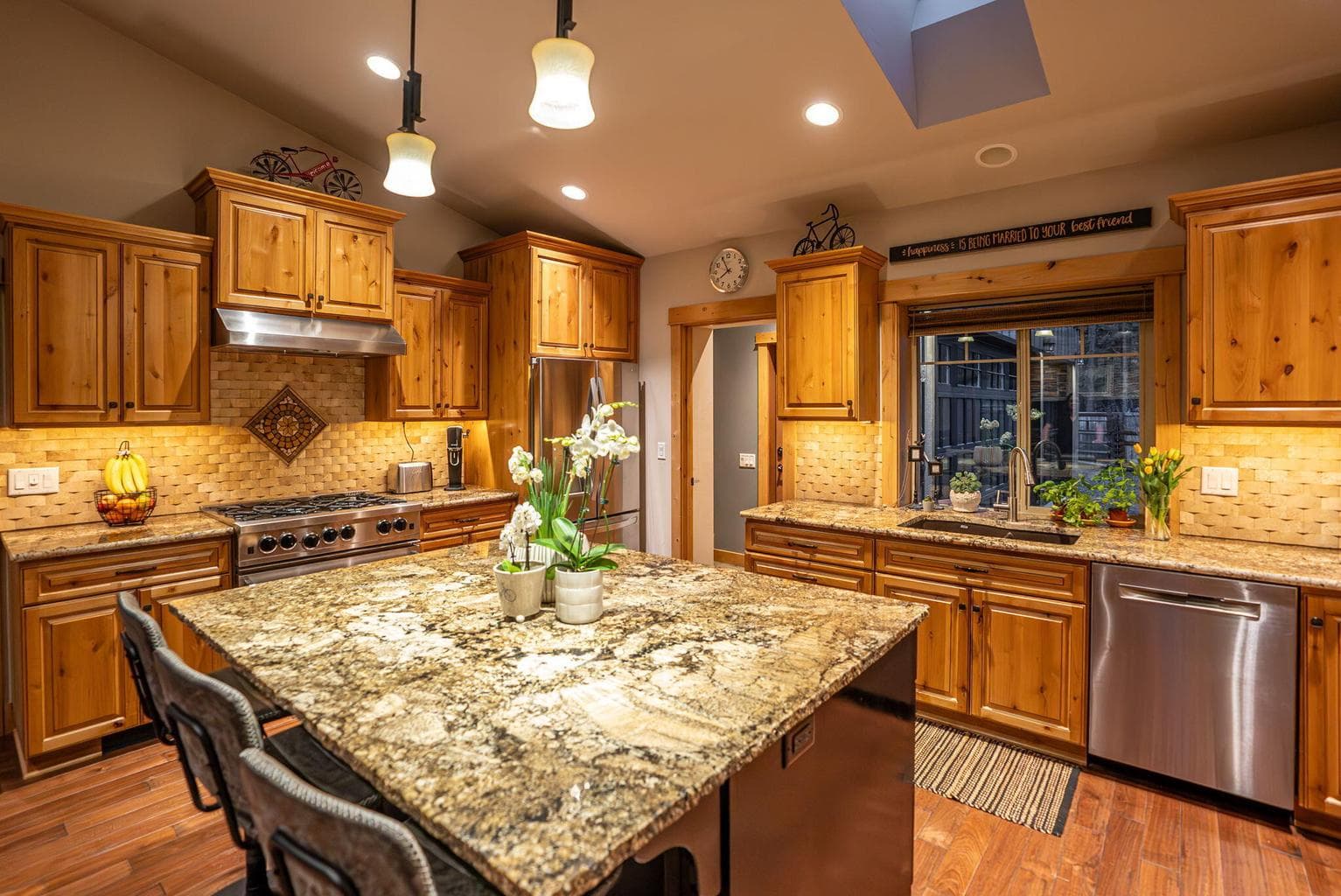 Chef’s kitchen with custom cabinetry and ample prep space