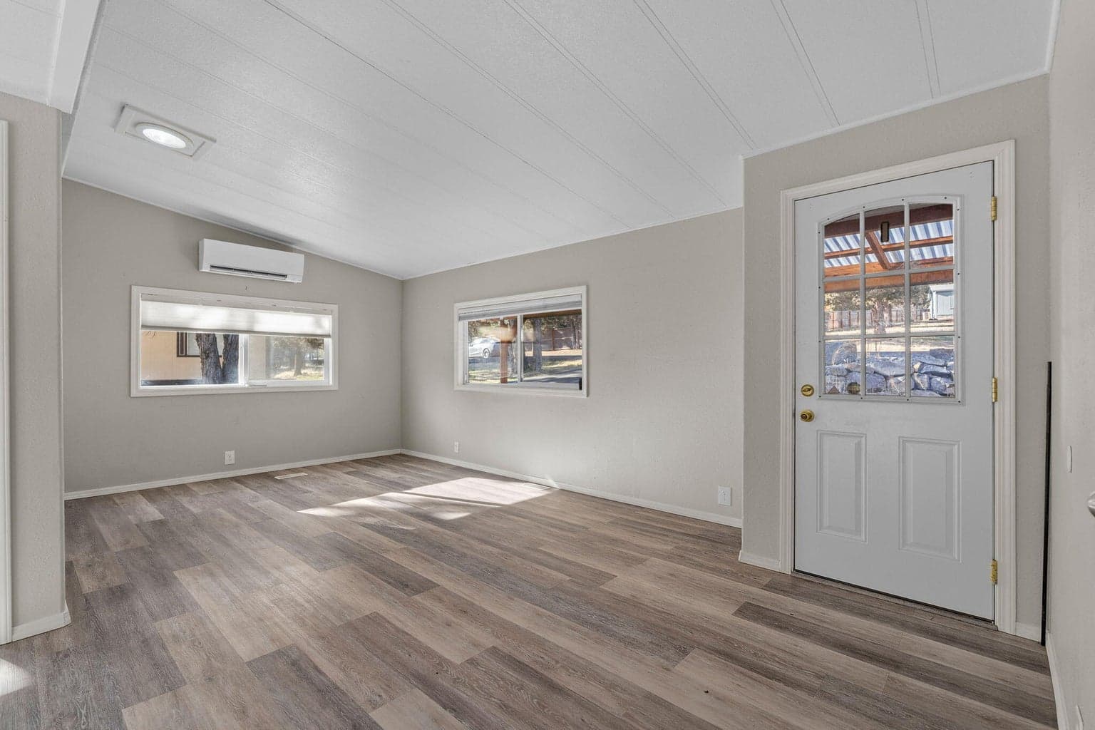 An abundance of natural light flows throughout the home & main living areas.