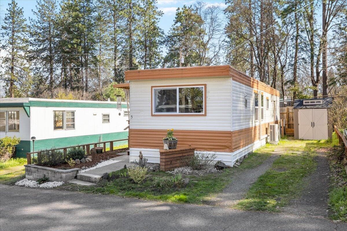 Dedicated parking space on the right side of your house - storage shed is included!