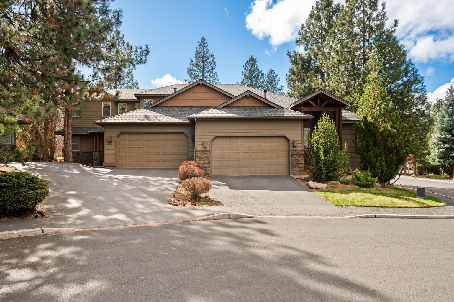 End-unit townhome offering added privacy of a natural buffer from neighboring homes lives more like a single-family residence.