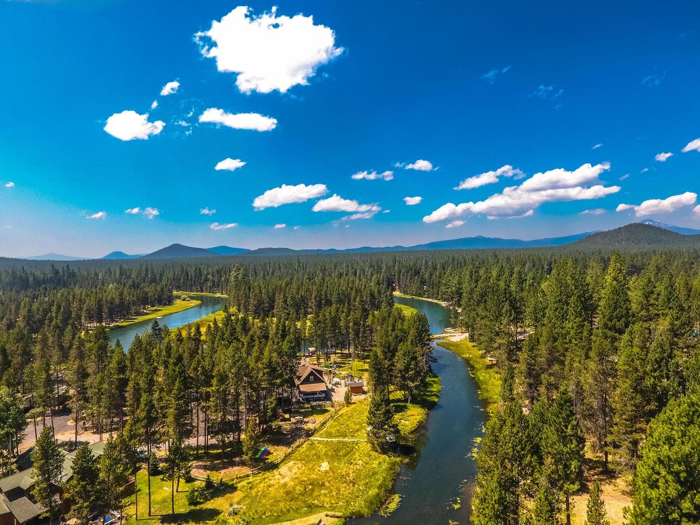 Live. play, and dream on a riverfront property.