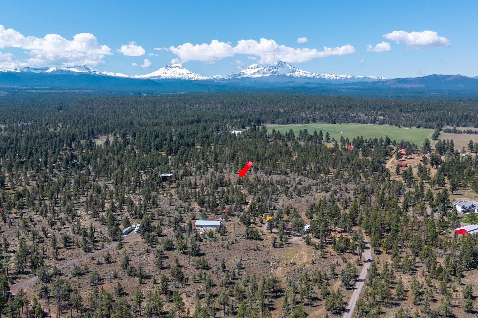 Arrow pointing to approximate property center.