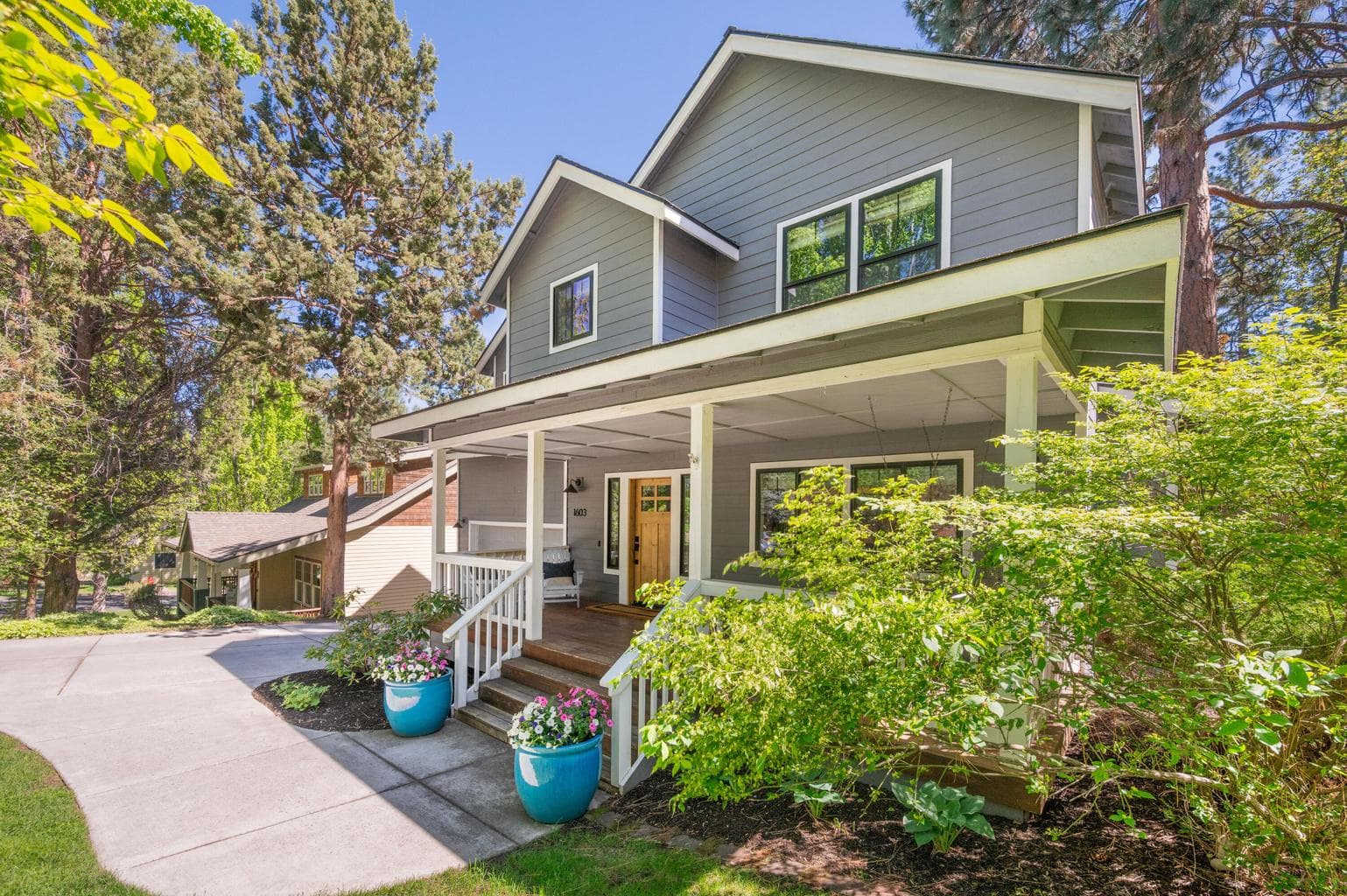 Timeless curb appeal with a classic, welcoming covered front porch.