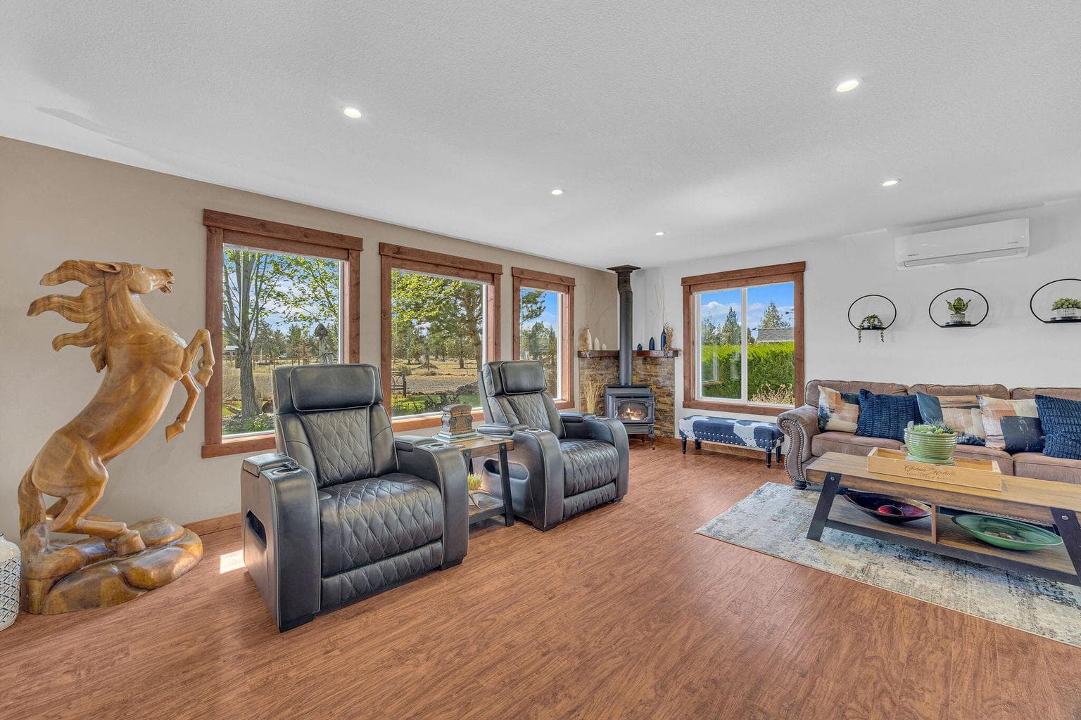 Living room, wonderful pine window trim and propane stove