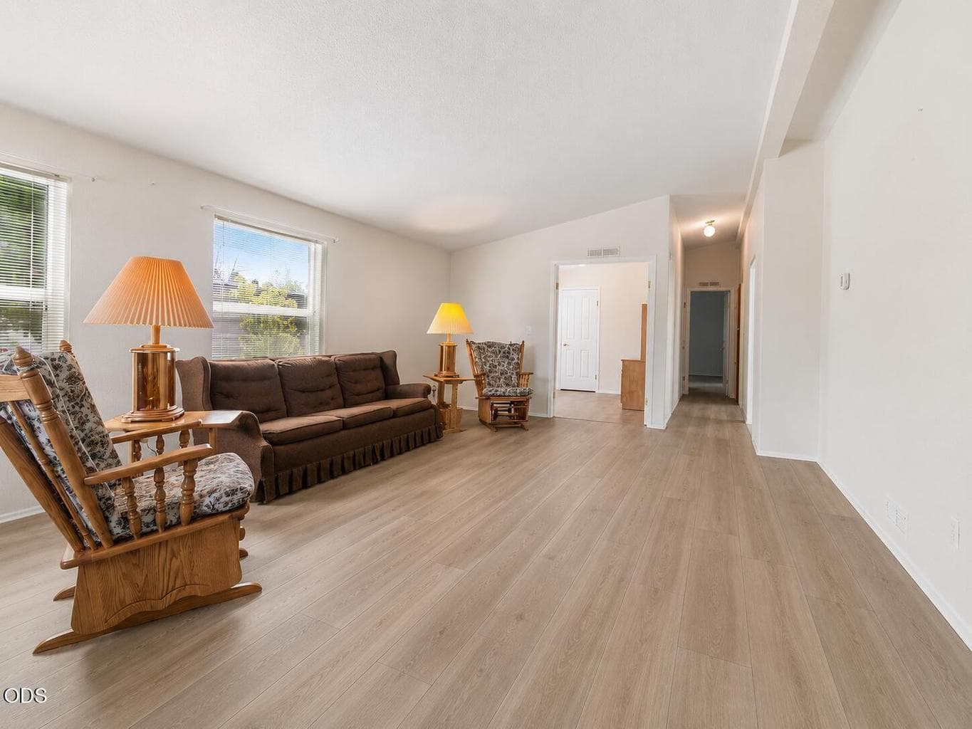 Image altered to show lvp-type flooring in place of existing carpet