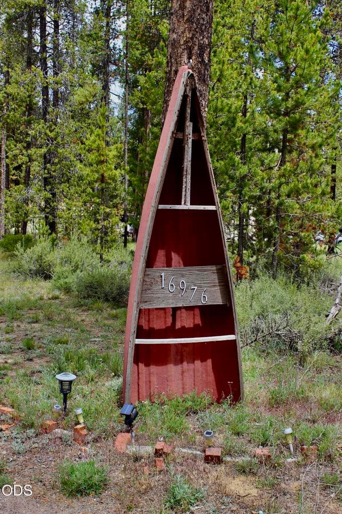 Address sign at driveway entrance