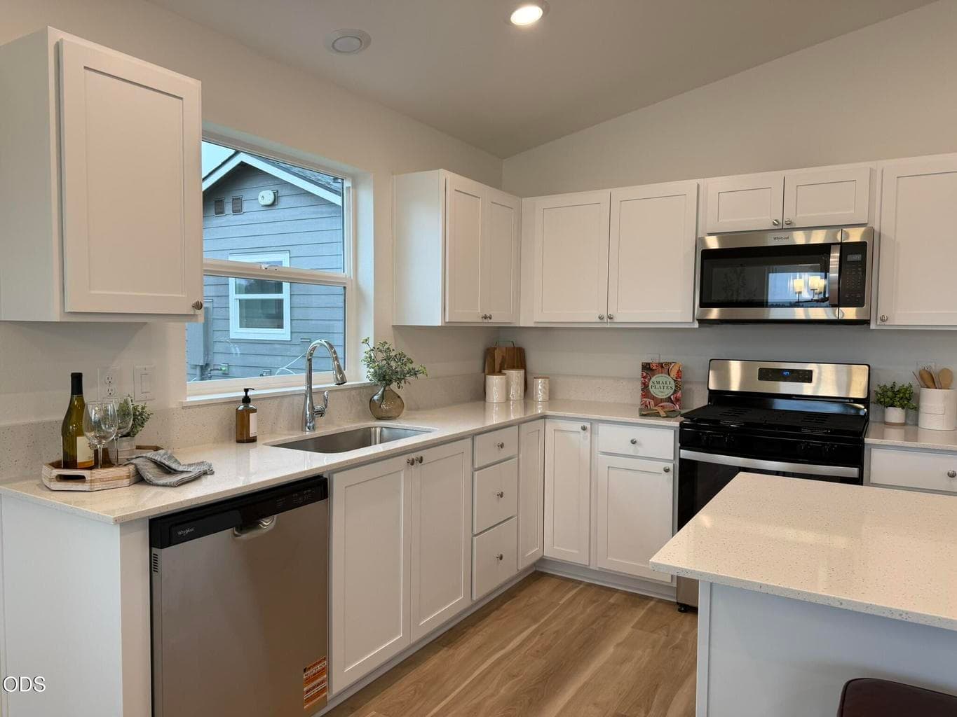 Photos of similar model. Actual floor plan and finishes may vary