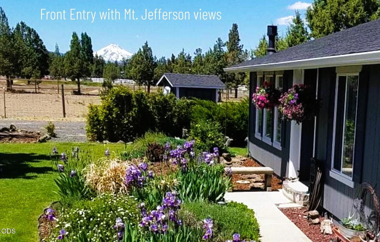 Well manicured front lawn with in ground sprinklers