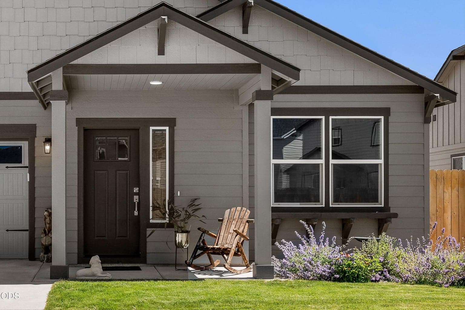 Covered front porch and easy maintenance yard.