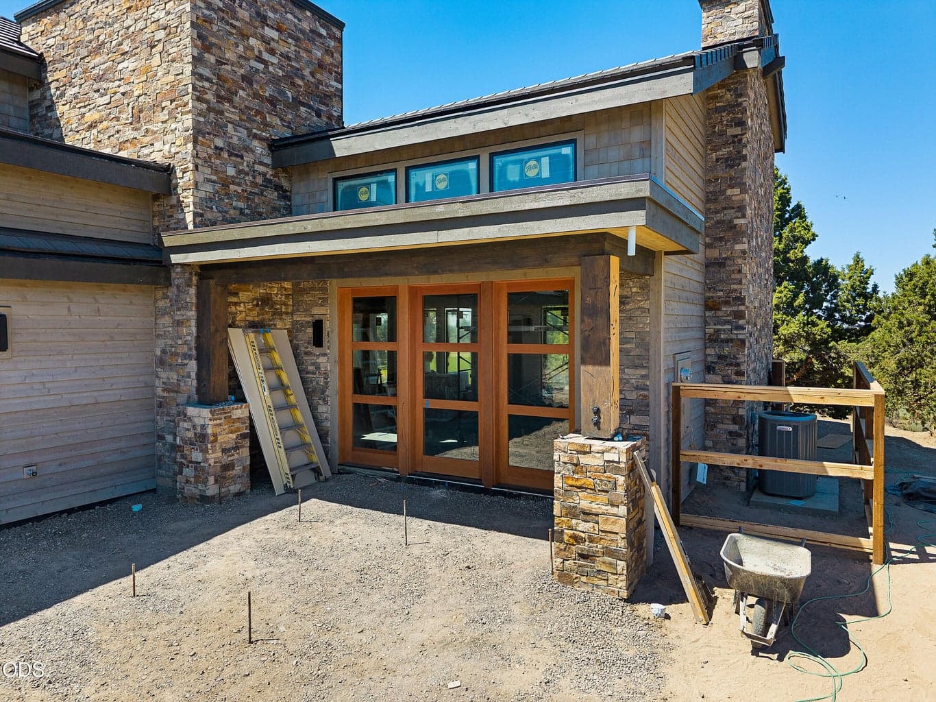 Front door with full length window panels on each side